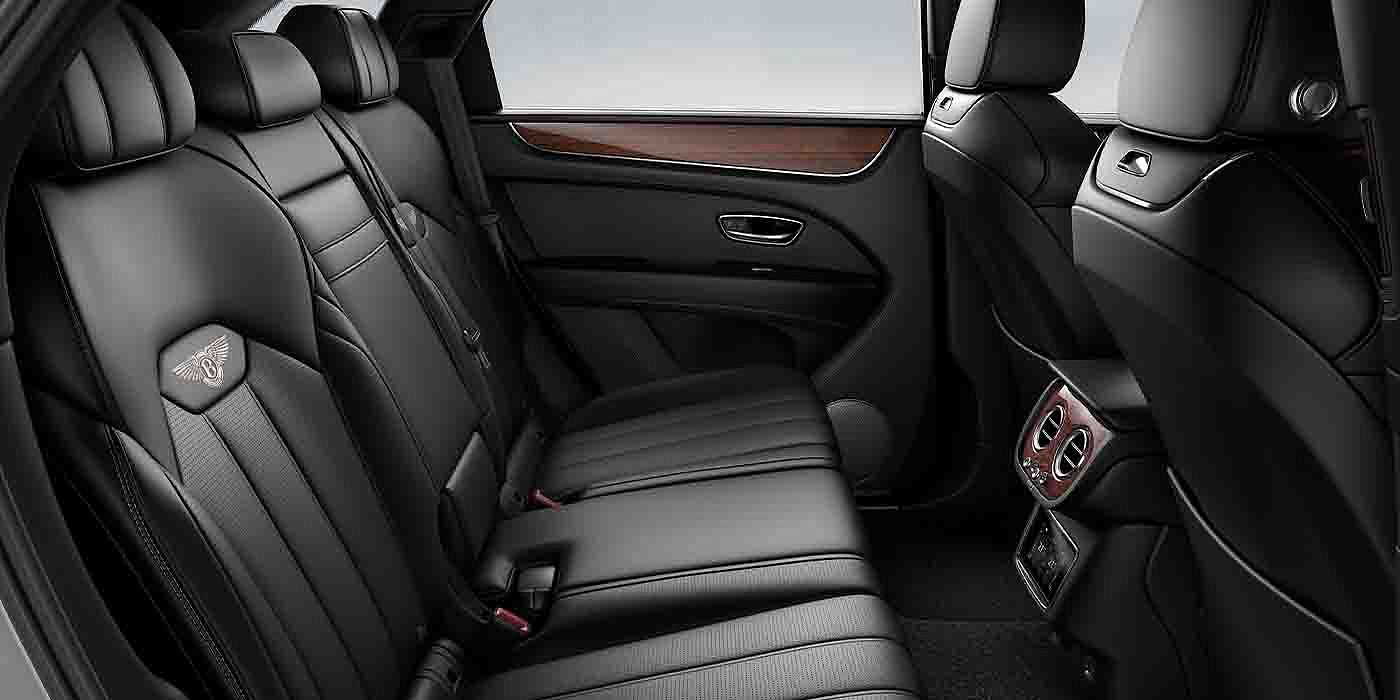 Bentley Kunming Bentley Bentayga EWB interior view for rear passengers with Beluga black hide.